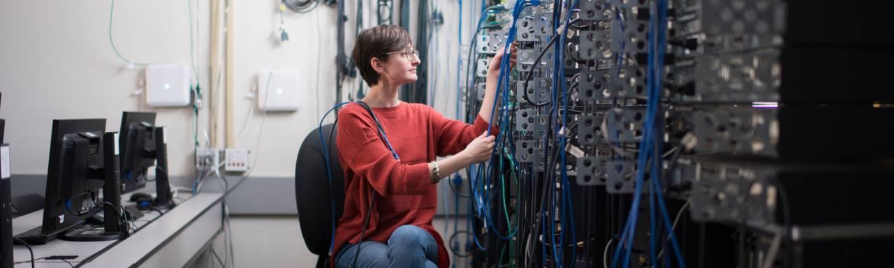 GVSU Information Technology student in an information systems lab.